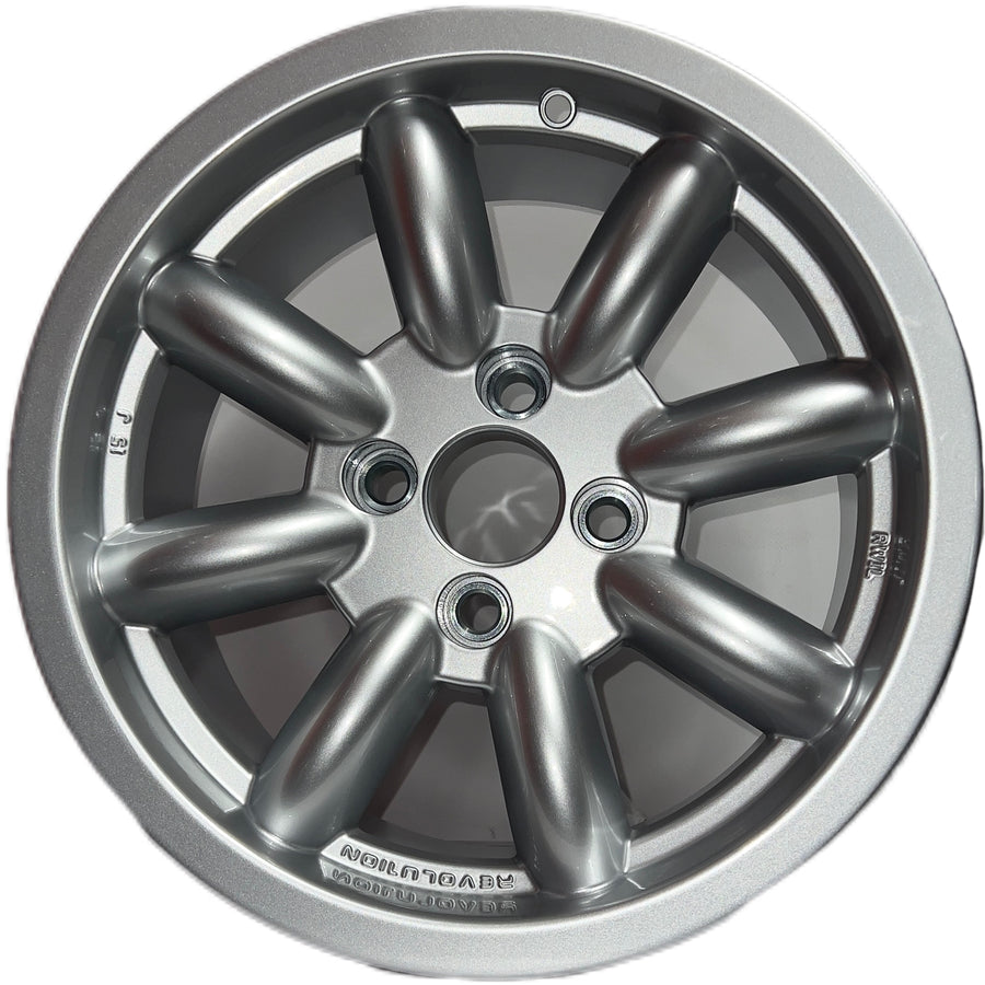 7x15 Revolution 8 spoke Silver alloy wheel